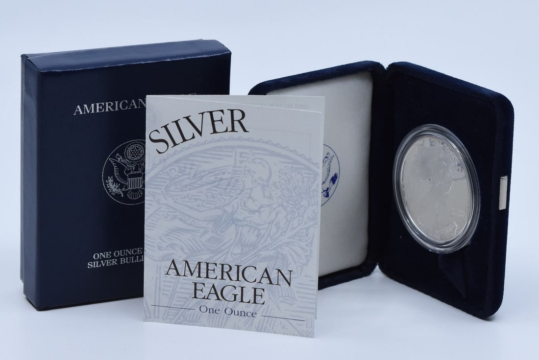 2002 W Proof American Eagle 1 oz Silver Coin OGP: 2002 W Proof American Eagle 1 oz Silver Coin OGP This 2002-W $1 American Proof Silver Eagle features a proof strike and is composed of 99.93% silver and 0.07% copper. Minted at West Point, the coin co