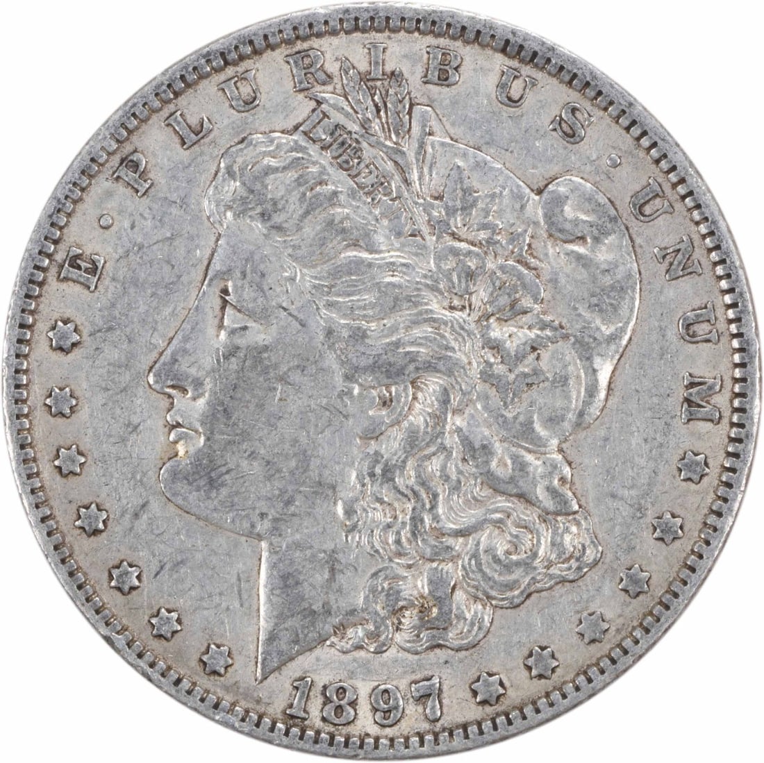 1897-O Morgan Silver Dollar XF Uncertified 90% Silver New Orleans Mint: 1897-O Morgan Silver Dollar XF Uncertified 90% Silver New Orleans Mint This 1897-O Morgan Silver Dollar is a beautiful example of American coinage, featuring a classic design by George T. Morgan. Stru