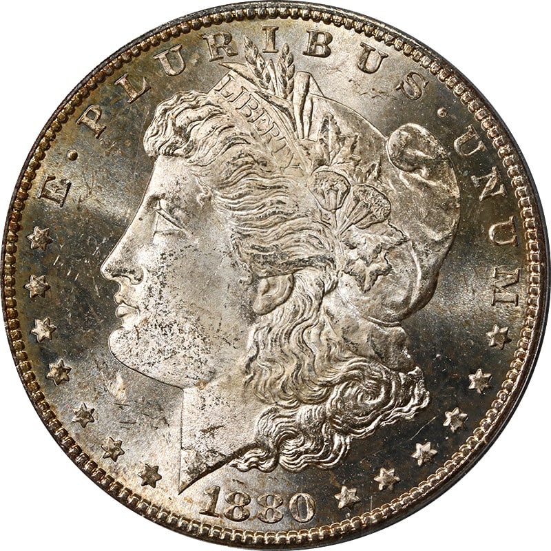 PCGS MS64 1880-S Morgan Dollar OGH Toning: PCGS MS64 1880-S Morgan Dollar OGH Toning This 1880-S Morgan Silver Dollar is graded MS64 by PCGS and features attractive toning. The coin is uncirculated and comes in an Old Green Holder (OGH). It is