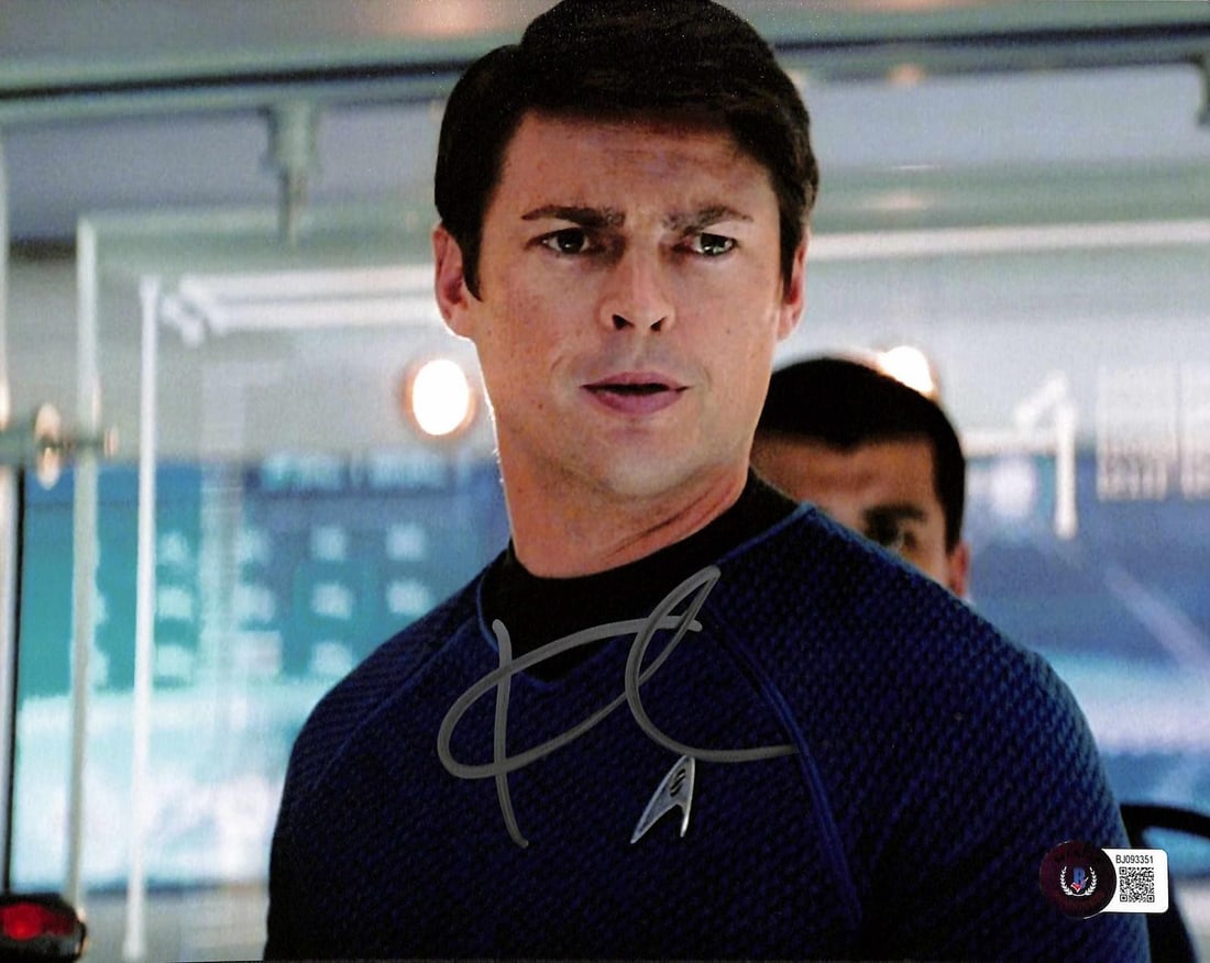 Beckett Authenticated Karl Urban Star Trek Bones Signed 8x10 Photo: Beckett Authenticated Karl Urban Star Trek Bones Signed 8x10 Photo This 8x10 full-color photograph from the Star Trek franchise features Karl Urban as Dr. Leonard 'Bones' McCoy aboard the U.S.S. Enter
