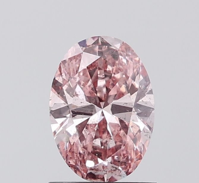 Loose Diamond - OVAL 1.03ct Fancy Intense Pink SI2: Loose Diamond - OVAL 1.03ct Fancy Intense Pink SI2 Source: This is a real non-mined Diamond that has been grown in a lab Shape: OVAL Carats: 1.03 Color: Fancy Intense Pink Certification: IGI Video:
