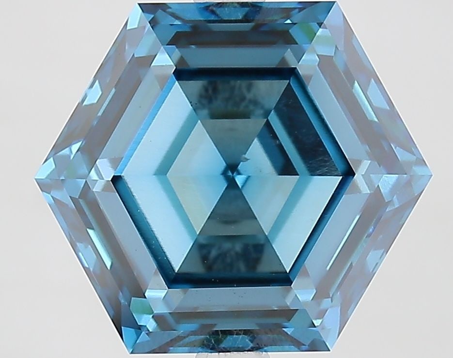 Loose Diamond - HEXAGONAL 5.12ct Fancy Vivid Blue VS2: Loose Diamond - HEXAGONAL 5.12ct Fancy Vivid Blue VS2 Source: This is a real non-mined Diamond that has been grown in a lab Shape: HEXAGONAL Carats: 5.12 Color: Fancy Vivid Blue Certification: IGI