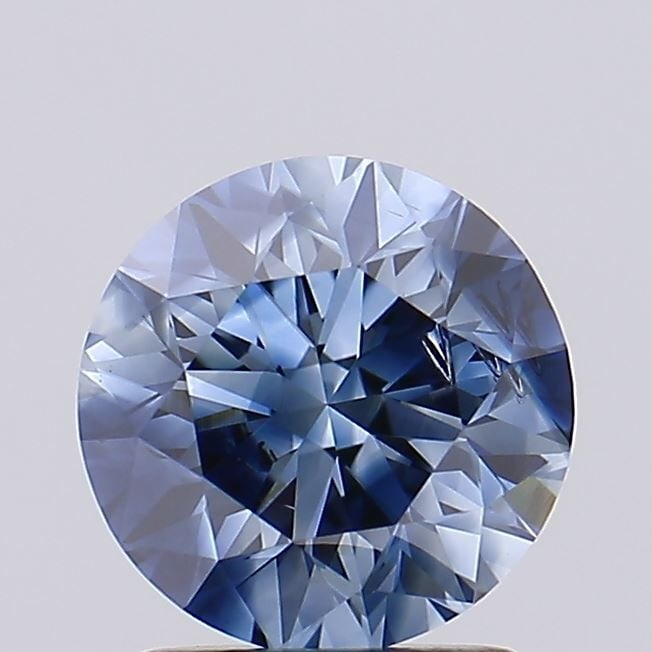 Loose Diamond - ROUND 1.71ct Fancy Vivid Blue I1: Loose Diamond - ROUND 1.71ct Fancy Vivid Blue I1 Source: This is a real non-mined Diamond that has been grown in a lab Shape: ROUND Carats: 1.71 Color: Fancy Vivid Blue Certification: NONE Video: