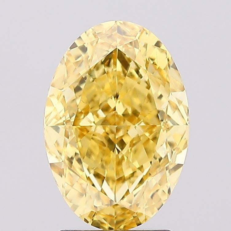 Loose Diamond - OVAL 2.68ct Fancy Vivid Yellow VS2: Loose Diamond - OVAL 2.68ct Fancy Vivid Yellow VS2 Source: This is a real non-mined Diamond that has been grown in a lab Shape: OVAL Carats: 2.68 Color: Fancy Vivid Yellow Certification: IGI Video: