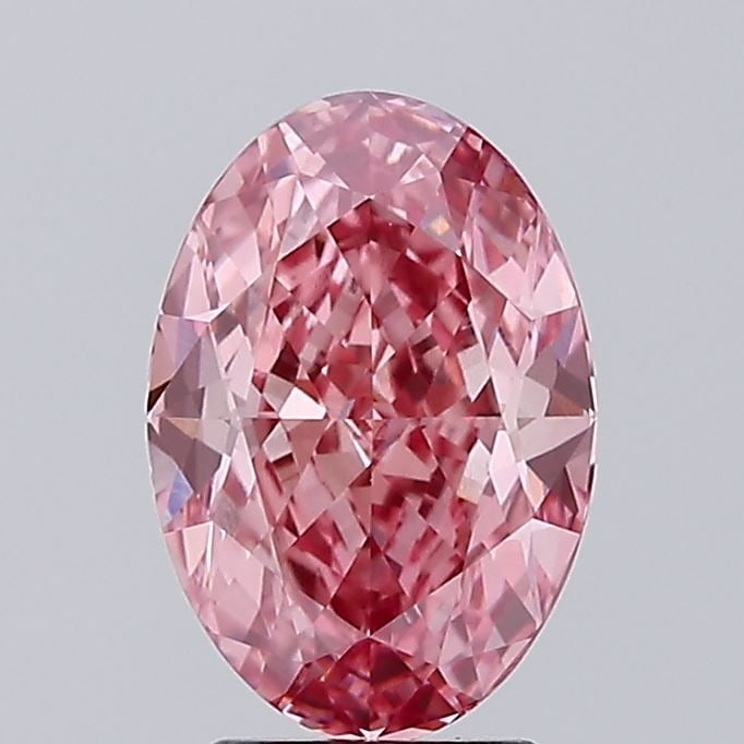 Loose Diamond - OVAL 3.15ct Fancy Vivid Pink VVS2: Loose Diamond - OVAL 3.15ct Fancy Vivid Pink VVS2 Source: This is a real non-mined Diamond that has been grown in a lab Shape: OVAL Carats: 3.15 Color: Fancy Vivid Pink Certification: IGI Additional i