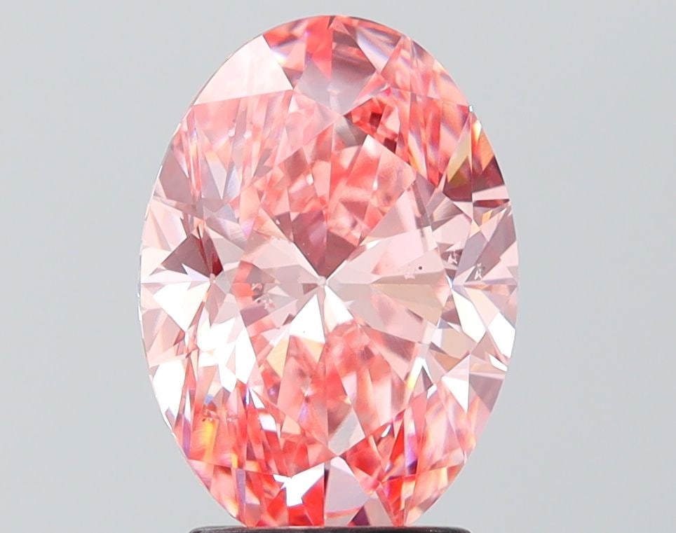 Loose Diamond - OVAL 3.0ct Fancy Vivid Pink SI1: Loose Diamond - OVAL 3.0ct Fancy Vivid Pink SI1 Source: This is a real non-mined Diamond that has been grown in a lab Shape: OVAL Carats: 3.0 Color: Fancy Vivid Pink Certification: IGI Video: