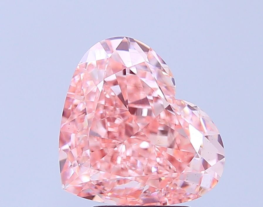 Loose Diamond - HEART 5.03ct Fancy Vivid Pink SI1: Loose Diamond - HEART 5.03ct Fancy Vivid Pink SI1 Source: This is a real non-mined Diamond that has been grown in a lab Shape: HEART Carats: 5.03 Color: Fancy Vivid Pink Certification: IGI Video: