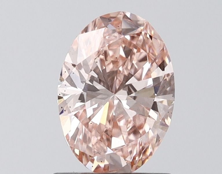 Loose Diamond - OVAL 1.09ct Fancy Vivid Pink VS2: Loose Diamond - OVAL 1.09ct Fancy Vivid Pink VS2 Source: This is a real non-mined Diamond that has been grown in a lab Shape: OVAL Carats: 1.09 Color: Fancy Vivid Pink Certification: IGI Video: