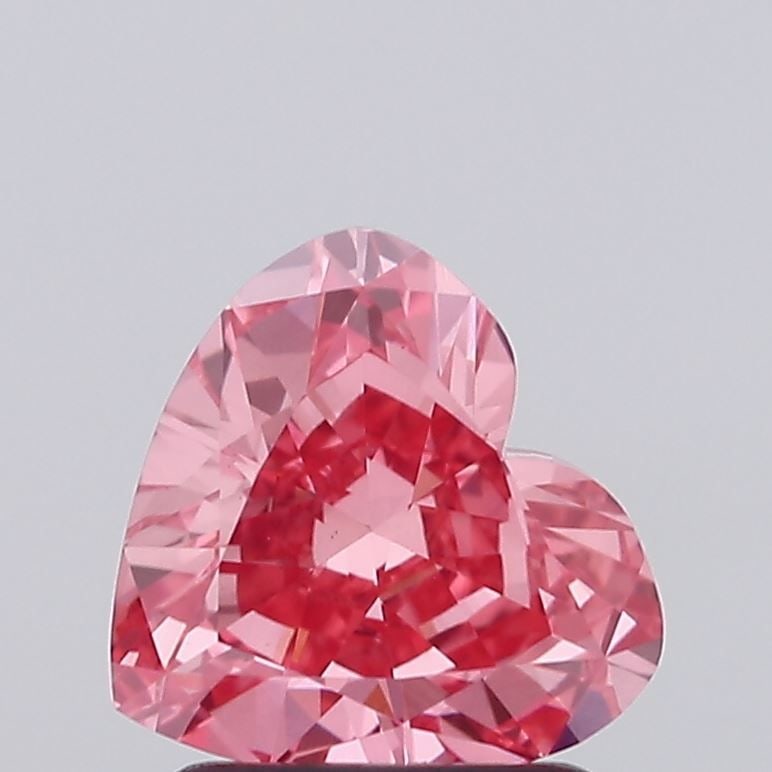 Loose Diamond - HEART 1.58ct Fancy Vivid Pink VVS2: Loose Diamond - HEART 1.58ct Fancy Vivid Pink VVS2 Source: This is a real non-mined Diamond that has been grown in a lab Shape: HEART Carats: 1.58 Color: Fancy Vivid Pink Certification: IGI Video: