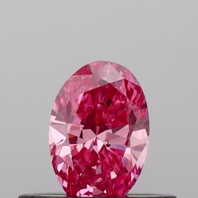 Loose Diamond - OVAL 0.35ct Fancy Vivid Pink VS2: Loose Diamond - OVAL 0.35ct Fancy Vivid Pink VS2 Source: This is a real non-mined Diamond that has been grown in a lab Shape: OVAL Carats: 0.35 Color: Fancy Vivid Pink Certification: IGI Video: