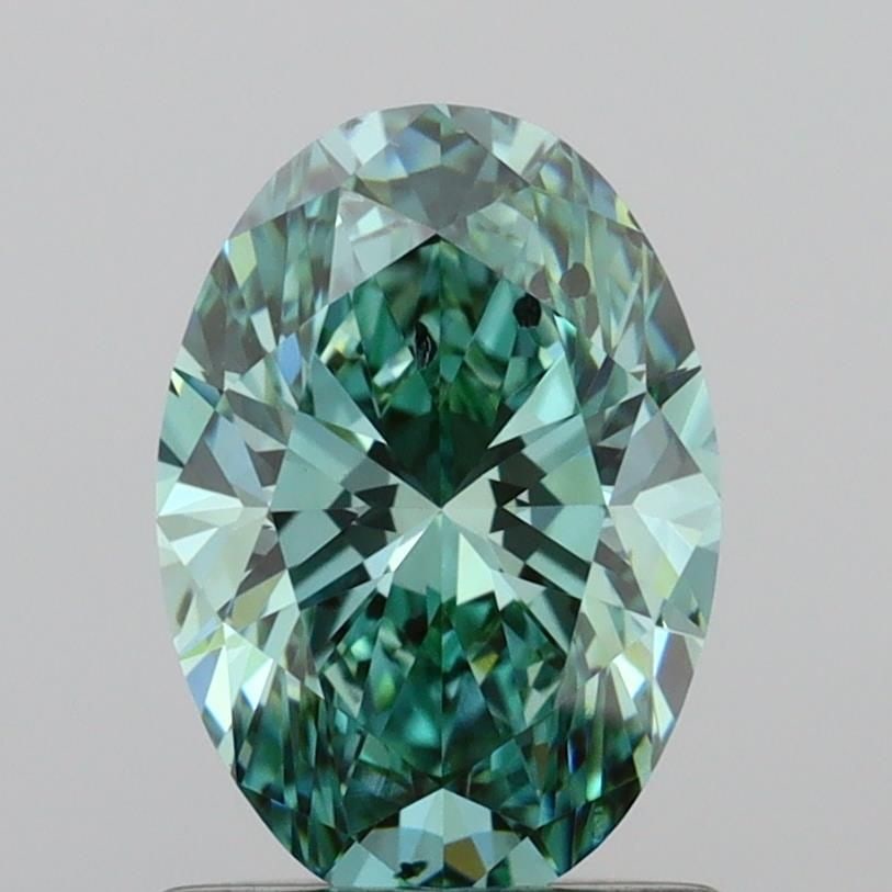 Loose Diamond - OVAL 1.1ct Fancy Vivid Green SI2: Loose Diamond - OVAL 1.1ct Fancy Vivid Green SI2 Source: This is a real non-mined Diamond that has been grown in a lab Shape: OVAL Carats: 1.1 Color: Fancy Vivid Green Certification: IGI Video: