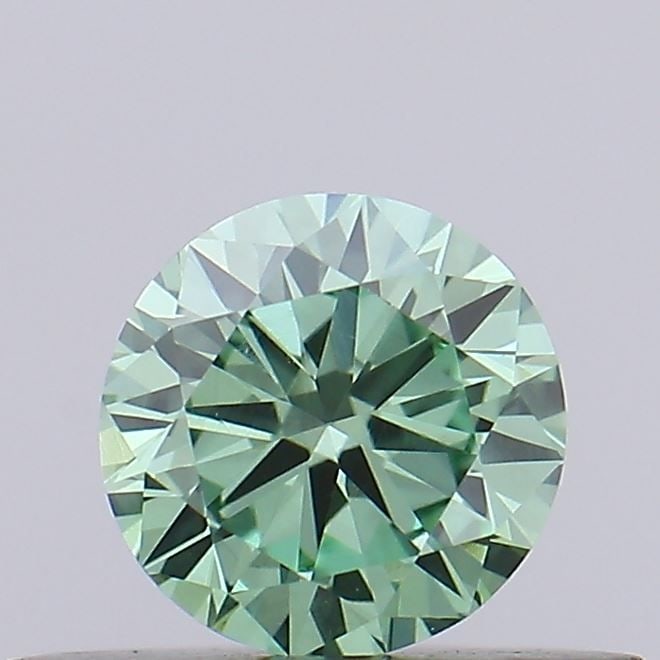 Loose Diamond - ROUND 0.32ct Fancy Vivid Green VS1: Loose Diamond - ROUND 0.32ct Fancy Vivid Green VS1 Source: This is a real non-mined Diamond that has been grown in a lab Shape: ROUND Carats: 0.32 Color: Fancy Vivid Green Certification: IGI Video: