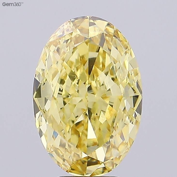 Loose Diamond - OVAL 7.03ct Fancy Vivid Yellow VS2: Loose Diamond - OVAL 7.03ct Fancy Vivid Yellow VS2 Source: This is a real non-mined Diamond that has been grown in a lab Shape: OVAL Carats: 7.03 Color: Fancy Vivid Yellow Certification: IGI Video: