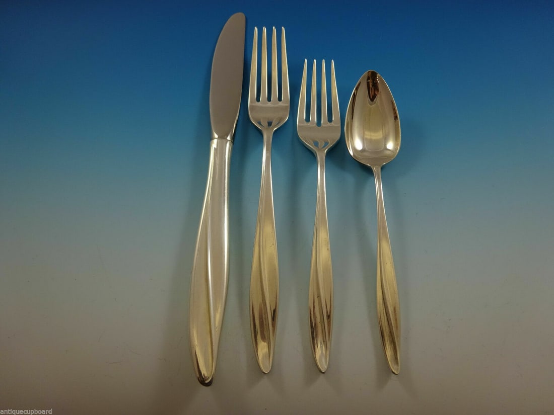 Gorham Firelight Sterling Silver 4-Piece Place Setting: Gorham Firelight Sterling Silver 4-Piece Place Setting Enhance your dining experience with the Firelight by Gorham sterling silver place setting. This exquisite 4-piece set includes a modern knife mea