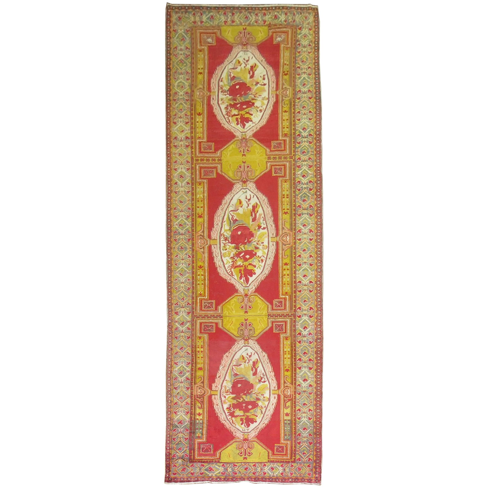 Early 20th Century Turkish Wool Hand Knotted Bessarabian Gallery Rug: Early 20th Century Turkish Wool Hand Knotted Bessarabian Gallery Rug This early 20th-century Turkish Ghiordes gallery rug features a Bessarabian style, hand-knotted in wool. The rug showcases vibrant 