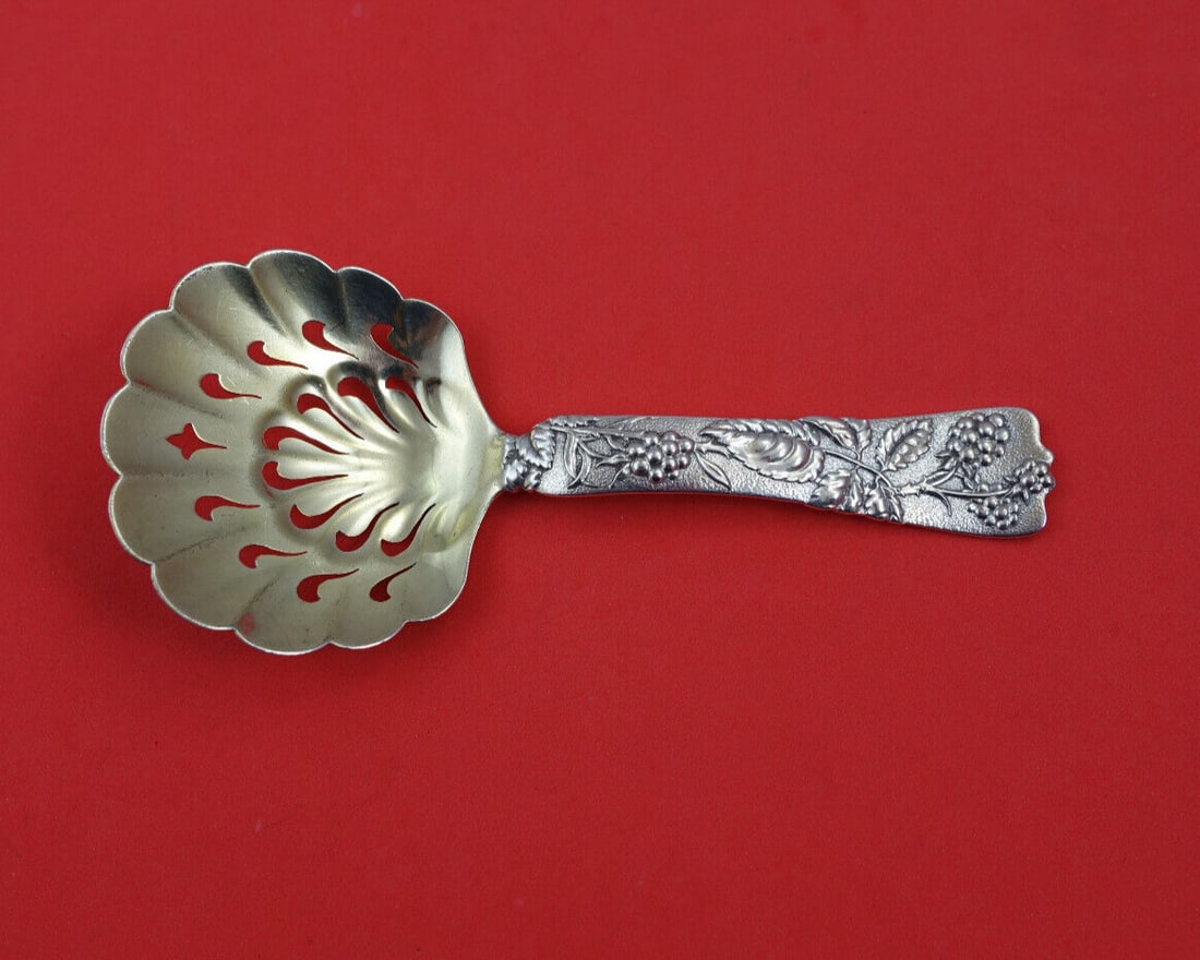 Tiffany & Co Vine Pattern Sterling Silver Bon Bon Spoon 5 1/4": Tiffany & Co Vine Pattern Sterling Silver Bon Bon Spoon 5 1/4" This exquisite bon bon spoon from the Vine pattern by Tiffany & Co. is crafted from high-quality sterling silver. Featuring a beautifully