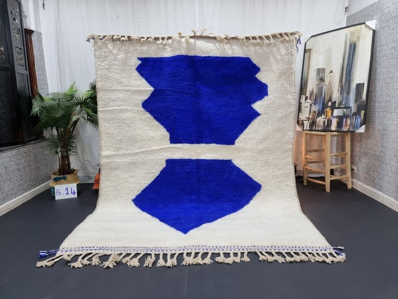 Authentic White Blue Berber Rug 100% Sheep Wool Handmade Morocco: Authentic White Blue Berber Rug 100% Sheep Wool Handmade Morocco Experience the beauty and craftsmanship of this stunning authentic White & Blue Handmade Moroccan Berber Rug. Handwoven in the Atlas Mo