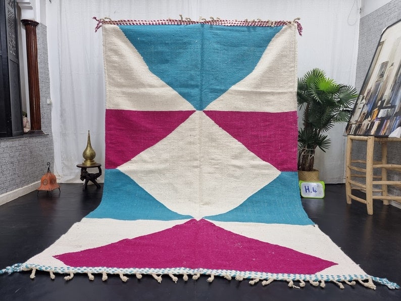 Authentic Handwoven Berber Rug 10 x 6.56 Feet Morocco: Authentic Handwoven Berber Rug 10 x 6.56 Feet Morocco Discover the exquisite craftsmanship of this Fabulous Authentic Rug, handwoven in the Atlas Mountains by skilled Berber women weavers. Utilizing t