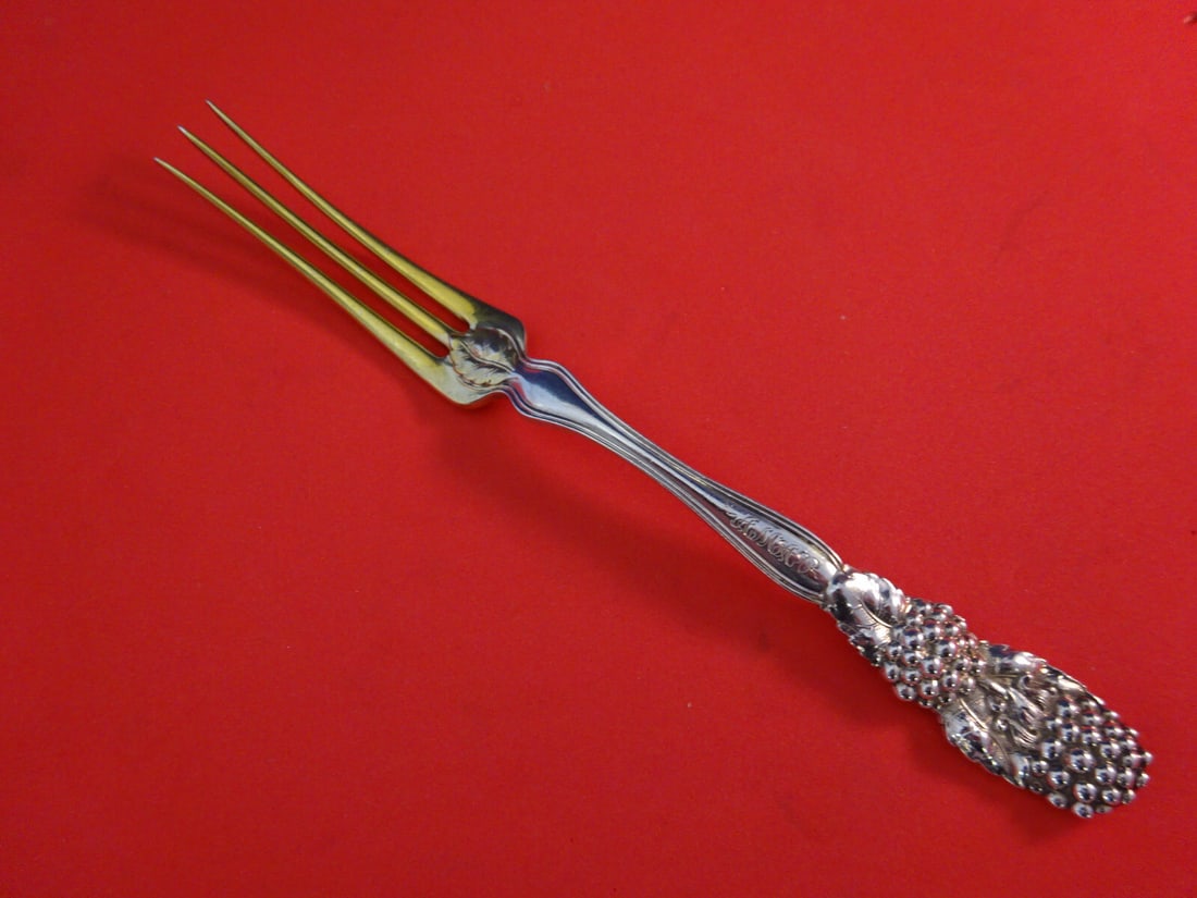 Tiffany & Co Blackberry Sterling Silver Fruit Fork Gold Wash 6 Inch: Tiffany & Co Blackberry Sterling Silver Fruit Fork Gold Wash 6 Inch This exquisite fruit fork from Tiffany & Co. showcases the elegant Blackberry pattern, crafted from fine sterling silver with gold-w