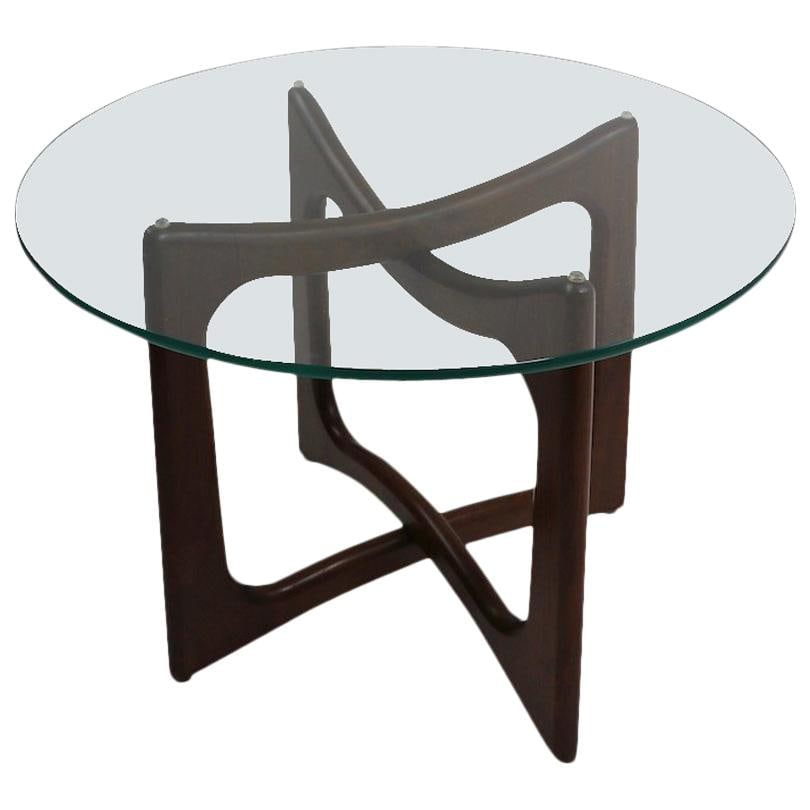 Adrian Pearsall Sculpted Wood Base End Table with Glass Top: Adrian Pearsall Sculpted Wood Base End Table with Glass Top This exquisite mid-century end table features a circular glass top supported by a beautifully sculpted walnut wood base, designed by the ren