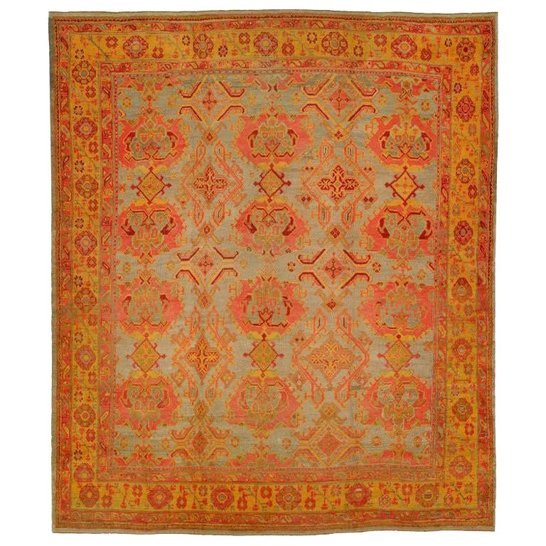 Antique Turkish Oushak 20th Century Hand-Knotted Wool Rug 12'4" x 14'5": Antique Turkish Oushak 20th Century Hand-Knotted Wool Rug 12'4" x 14'5" This exquisite 20th century antique Turkish Oushak rug showcases a stunning silver shaded field complemented by a rich mustard b