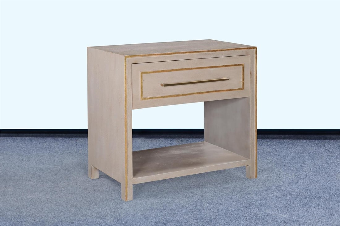 Wilmont Nightstand with Pewter Finish and Gold Accents: Wilmont Nightstand with Pewter Finish and Gold Accents Introducing the Chic Wilmont Nightstand, a stylish addition to your bedroom decor. This nightstand features a sleek Pewter finish complemented by