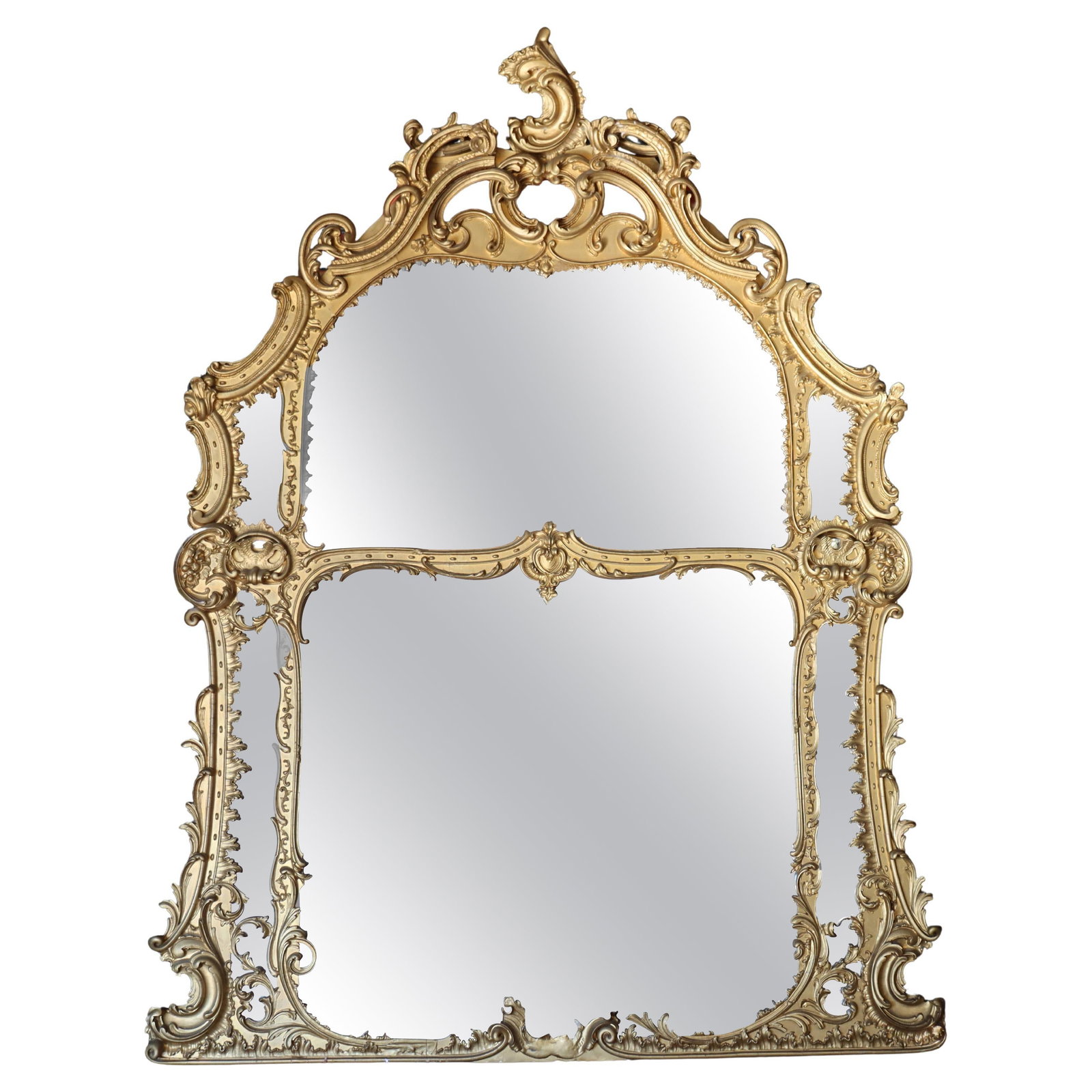 Late 19th Century French Giltwood Mantle Mirror with Scroll and Foliate Design: Late 19th Century French Giltwood Mantle Mirror with Scroll and Foliate Design This monumental French Louis XIV mantle mirror from the late 19th century features an ornate giltwood frame with intricat