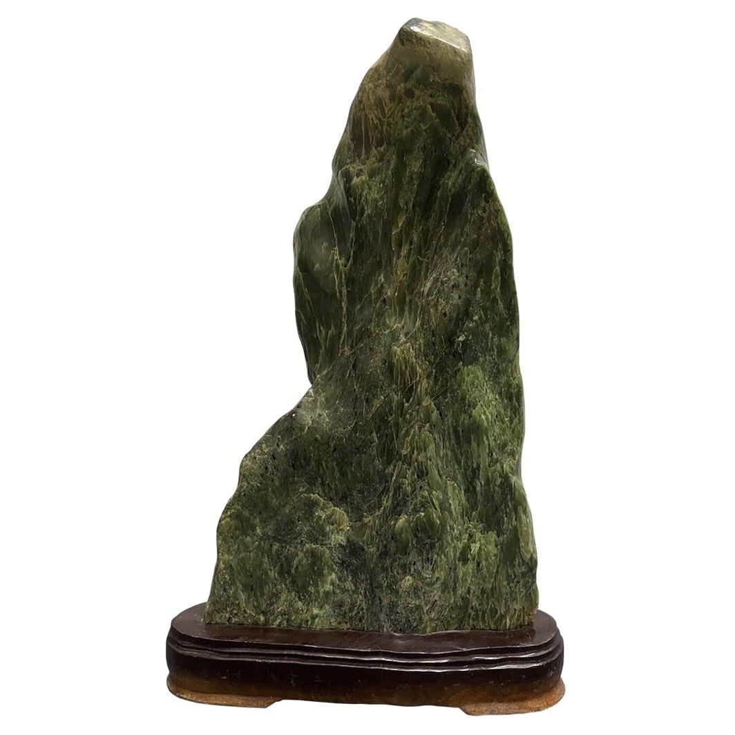 Antique Early 20th Century Chinese Serpentine Scholar Rock 22.5in: Antique Early 20th Century Chinese Serpentine Scholar Rock 22.5in This exquisite Early 20th Century Antique Chinese Green Serpentine Scholar Rock is a remarkable example of craftsmanship from the peri
