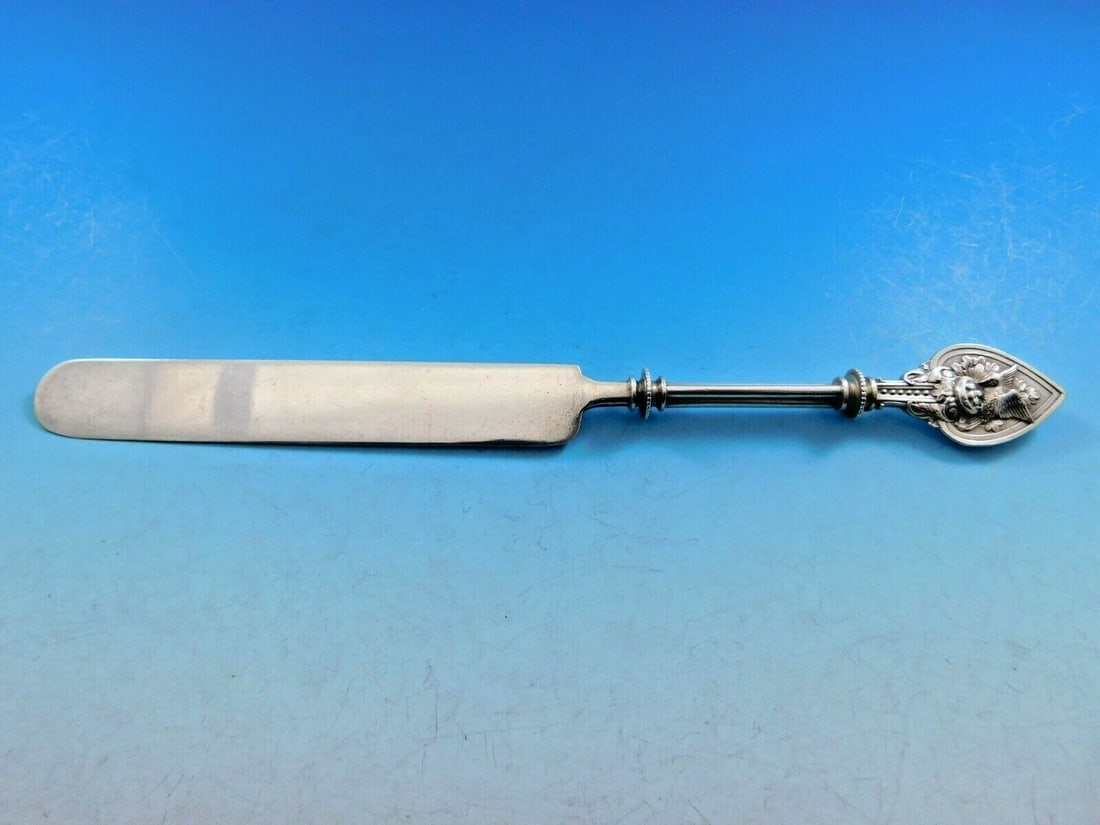 Whiting Bird on Nest Sterling Silver Luncheon Knife 8 3/8": Whiting Bird on Nest Sterling Silver Luncheon Knife 8 3/8" Discover the elegance of this Whiting sterling silver regular/luncheon knife, beautifully crafted in the "Bird on Nest" pattern. Measuring 8 