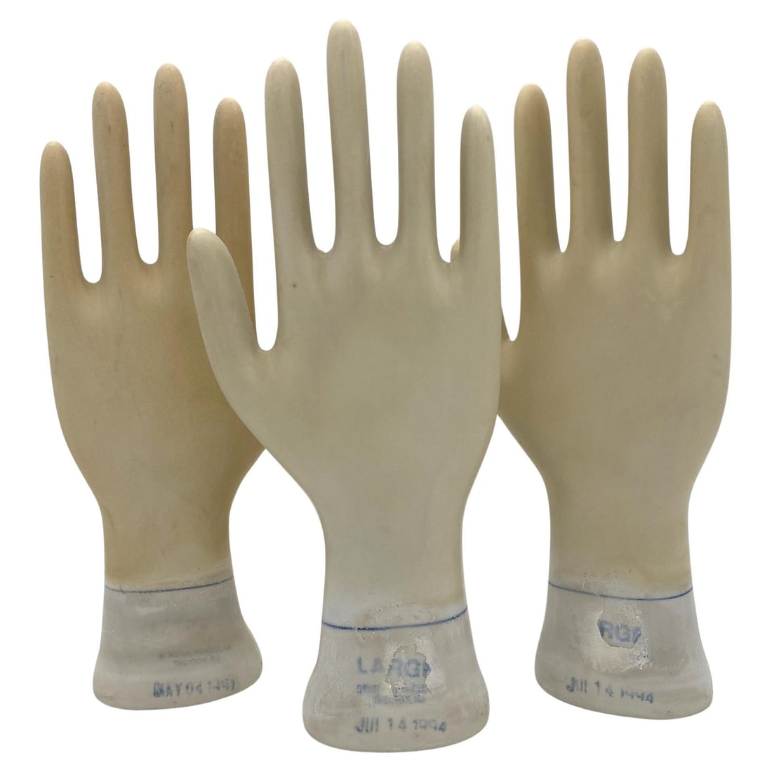 Set of Three 1994 American Industrial Porcelain Glove Molds: Set of Three 1994 American Industrial Porcelain Glove Molds Discover a remarkable set of three Vintage American Industrial Figural Porcelain Glove Molds, each a unique relic from the manufacturing ind