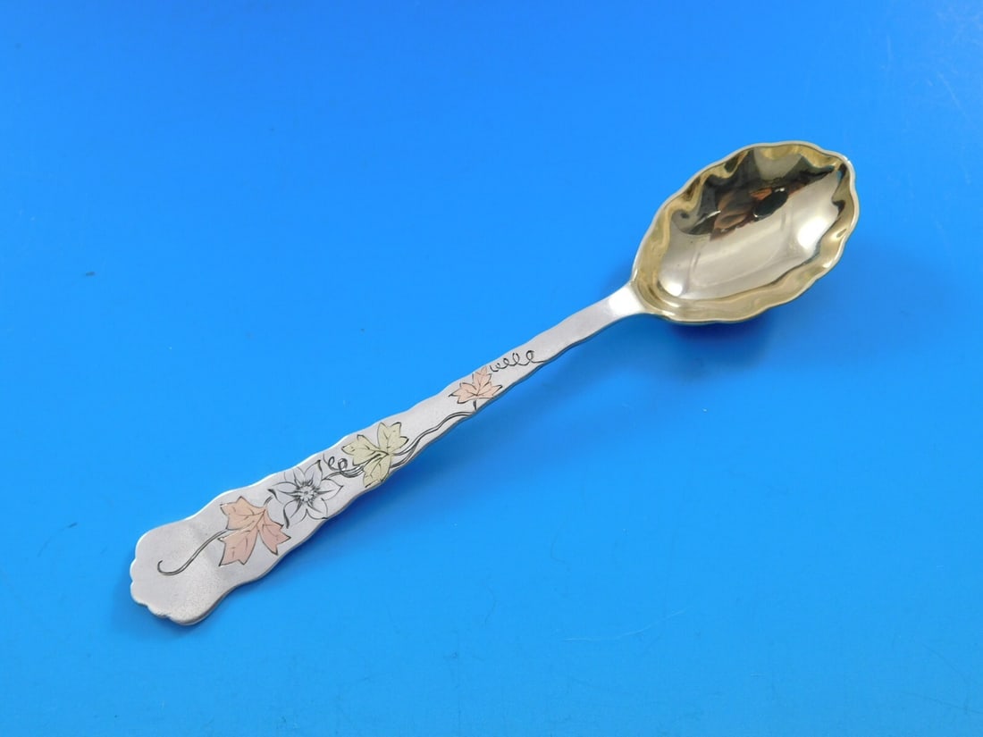 Tiffany & Co Mixed Metals Sterling Silver Demitasse Spoon Rose Gold Accents: Tiffany & Co Mixed Metals Sterling Silver Demitasse Spoon Rose Gold Accents This exquisite demitasse spoon from Tiffany & Co. features a stunning design in the Mixed Metals pattern. Crafted from high-