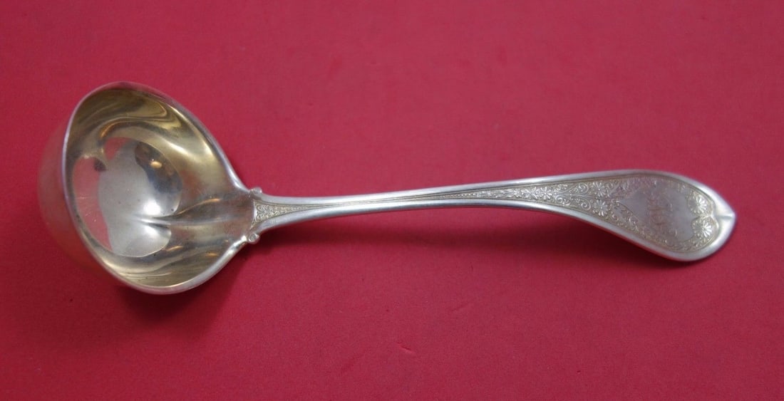 Wood & Hughes Marguerite Sterling Silver Gravy Ladle 7 3/4" Deep Bowl: Wood & Hughes Marguerite Sterling Silver Gravy Ladle 7 3/4" Deep Bowl This sterling silver gravy ladle features the Marguerite pattern by Wood & Hughes. It has a deep bowl for serving and measures 7 3