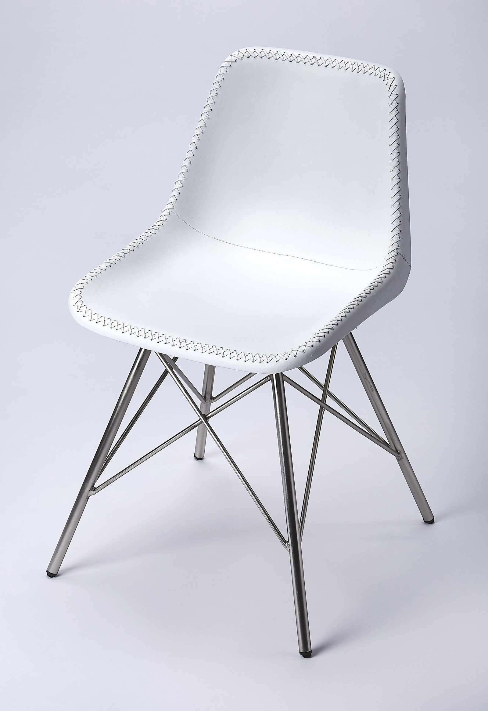 Mid-Century Modern White Leather Chair from Inland Collection: Mid-Century Modern White Leather Chair from Inland Collection This mid-century modern style chair features a white finish and a rectangular shape, offering a stylish and contemporary addition to any s