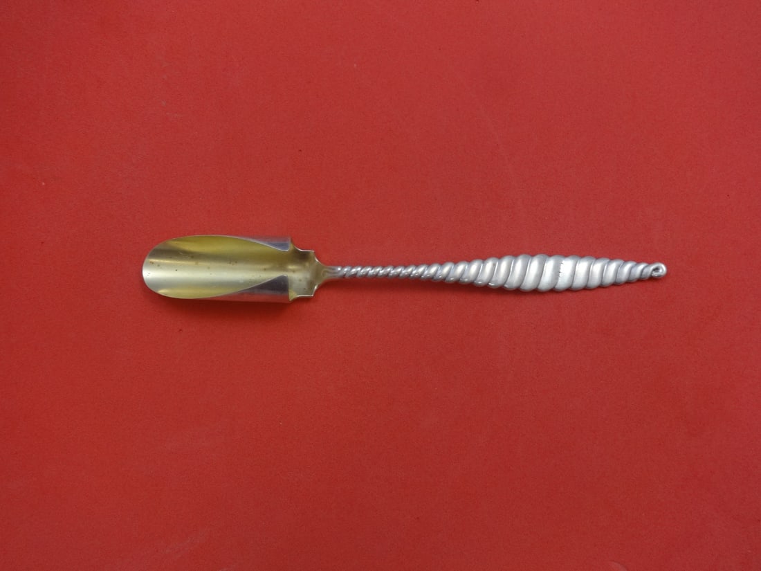 Whiting Oval Twist Sterling Silver Cheese Scoop 8 3/4" Goldwashed: Whiting Oval Twist Sterling Silver Cheese Scoop 8 3/4" Goldwashed This exquisite cheese scoop is crafted from high-quality sterling silver by the renowned maker Whiting. Featuring a beautiful oval twi