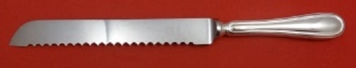 Greggio Giorgio Sterling Silver Serrated Cake Knife 11 3/4": Greggio Giorgio Sterling Silver Serrated Cake Knife 11 3/4" This exquisite cake knife from the Giorgio pattern by Greggio is crafted from high-quality sterling silver. Featuring a serrated edge, this 