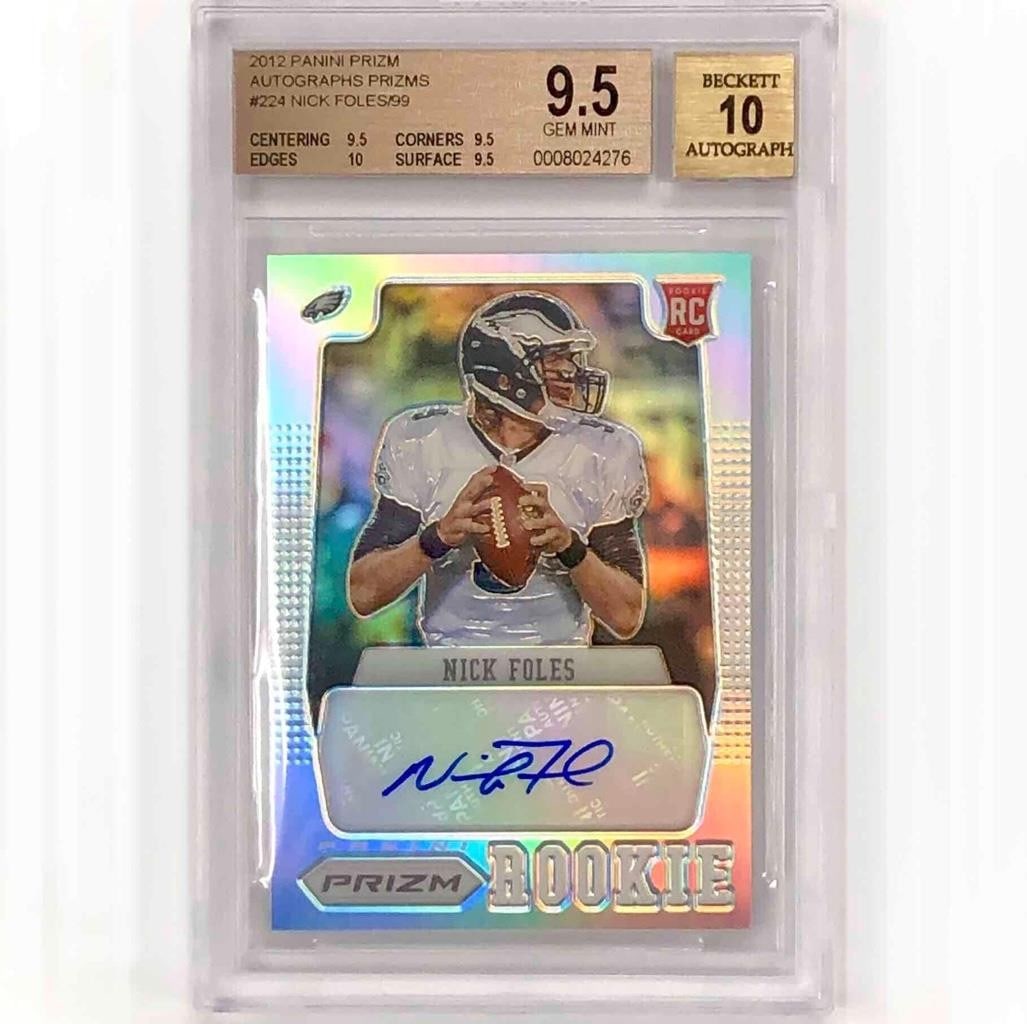 2012 Panini Prizm Nick Foles Holo Silver RC Autograph /99 BGS 9.5: 2012 Panini Prizm Nick Foles Holo Silver RC Autograph /99 BGS 9.5 This 2012 Panini Prizm rookie card features Nick Foles and is autographed, making it a must-have for collectors. Graded at 9.5 by BGS,