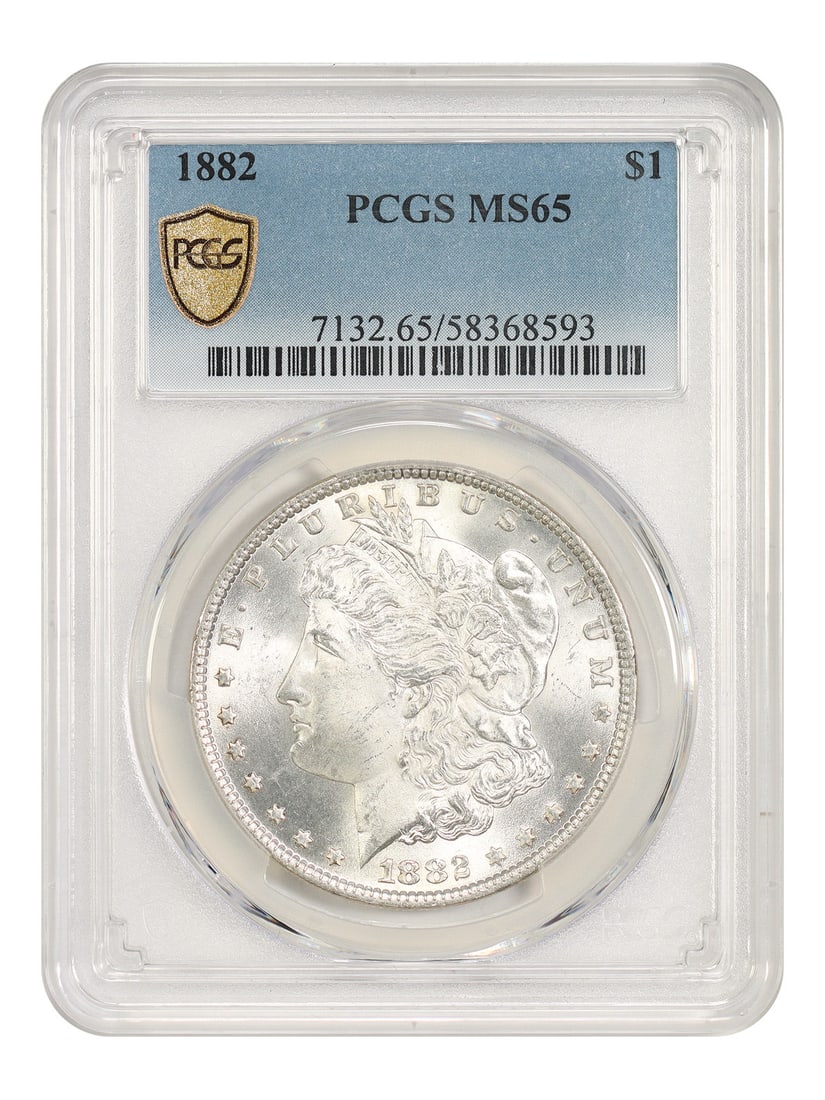 PCGS MS65 1882 Philadelphia Morgan Silver Dollar: PCGS MS65 1882 Philadelphia Morgan Silver Dollar This is an 1882 Morgan Dollar with a $1 denomination, minted in Philadelphia. The coin is uncirculated and has been graded MS65 by PCGS, reflecting its