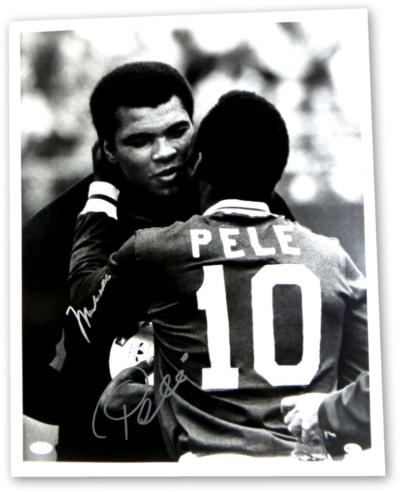 JSA Dual Signed Muhammad Ali Pele 16x20 B W Photo: JSA Dual Signed Muhammad Ali Pele 16x20 B W Photo This 16x20 black and white photo from 1970 features dual autographs from Muhammad Ali and Pele. The photo has been authenticated by James Spence Authe