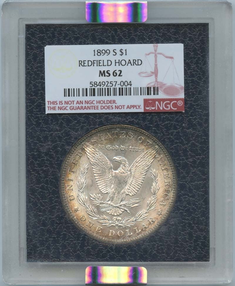 1899-S NGC MS62 Morgan Dollar Redfield Hoard Uncirculated: 1899-S NGC MS62 Morgan Dollar Redfield Hoard Uncirculated This 1899-S Morgan Dollar is a remarkable piece from the Redfield Hoard, certified by NGC with a grade of MS62. It showcases an uncirculated c