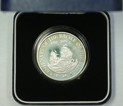 1982 Saint Kitts Nevis Battle of the Saints $20 Silver Proof Coin: 1982 Saint Kitts Nevis Battle of the Saints $20 Silver Proof Coin This is a 1982 Saint Kitts-Nevis Commemorative Battle of the Saints $20 Proof Coin. The coin features a milky light blue toning on bot