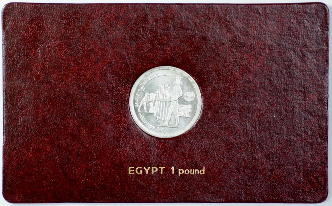 Egypt 1 Pound Silver Coin 1981 FAO World Food Day Album Insert: Egypt 1 Pound Silver Coin 1981 FAO World Food Day Album Insert This collectible album insert commemorates FAO World Food Day on October 16, 1981, and includes an Egypt 1 Pound coin made of .720 silver