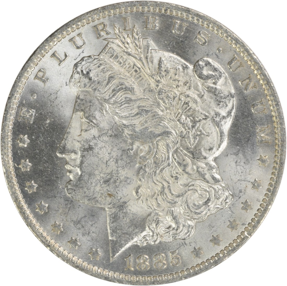 Uncirculated 1885-O Silver Morgan Dollar Brilliant Uncertified US Coin: Uncirculated 1885-O Silver Morgan Dollar Brilliant Uncertified US Coin This is an uncirculated 1885-O Morgan Silver Dollar featuring a brilliant uncirculated (BU) grade. The coin is composed of silver