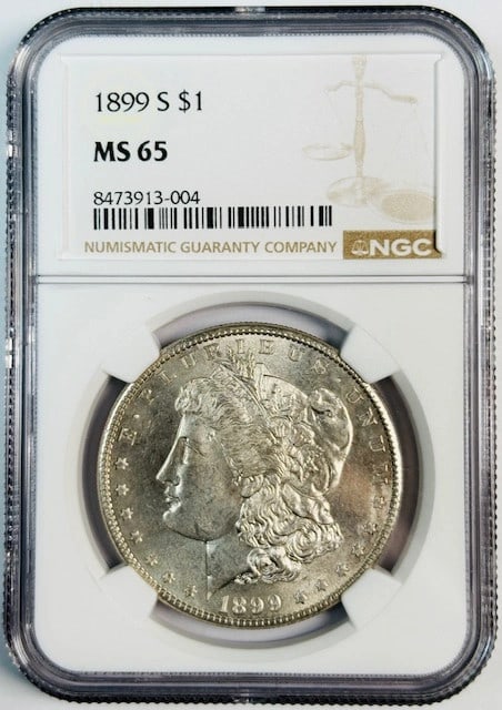 1899-S Morgan Dollar NGC MS-65 PL: 1899-S Morgan Dollar NGC MS-65 PL This 1899 S Morgan Silver Dollar is graded MS-65 with proof-like surfaces and has been certified by NGC. Minted in San Francisco, this pre-owned coin is composed of s