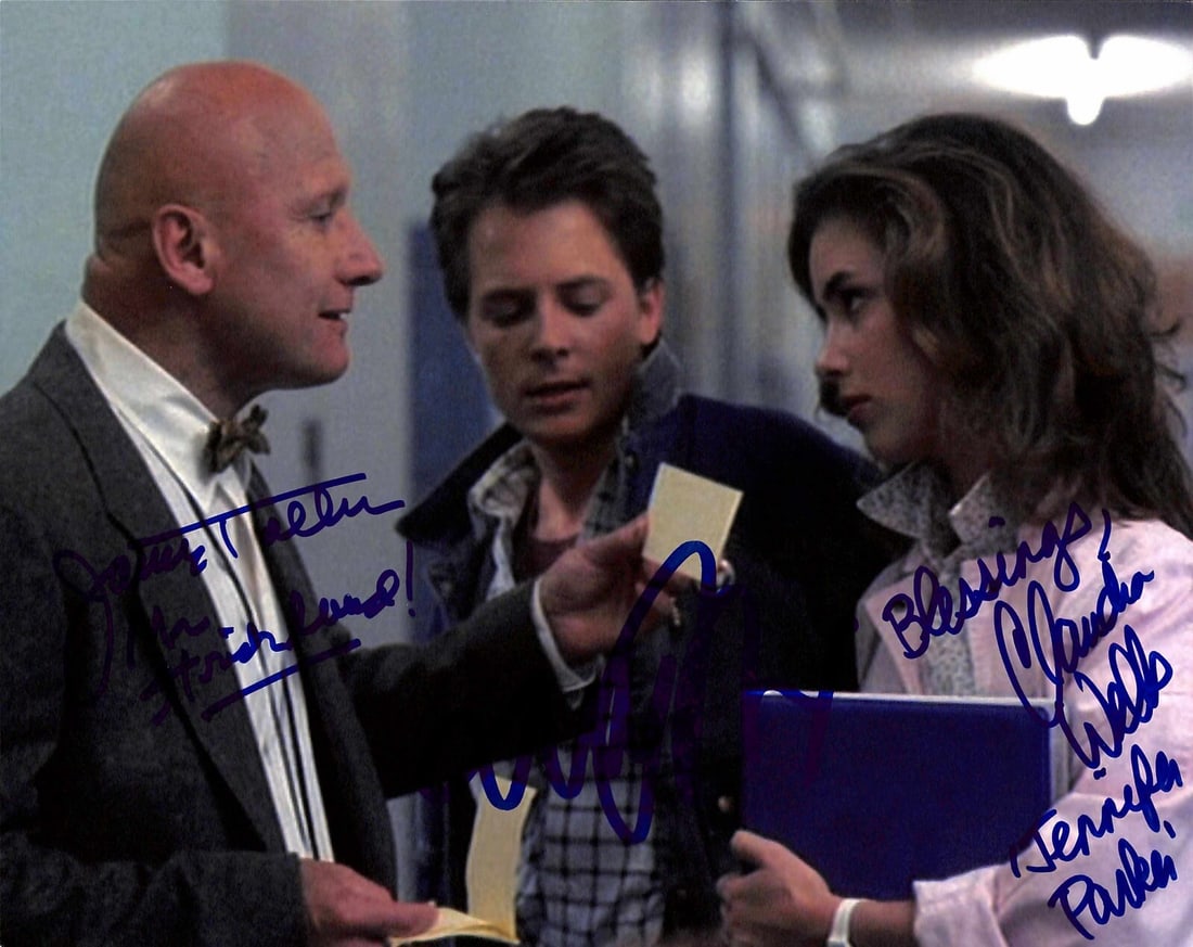 Back to the Future Signed 8x10 Photo by Fox Tolkan Wells Beckett Certified: Back to the Future Signed 8x10 Photo by Fox Tolkan Wells Beckett Certified This autographed 8x10 photograph features the iconic cast from 'Back to the Future', including Michael J. Fox as Marty McFly,