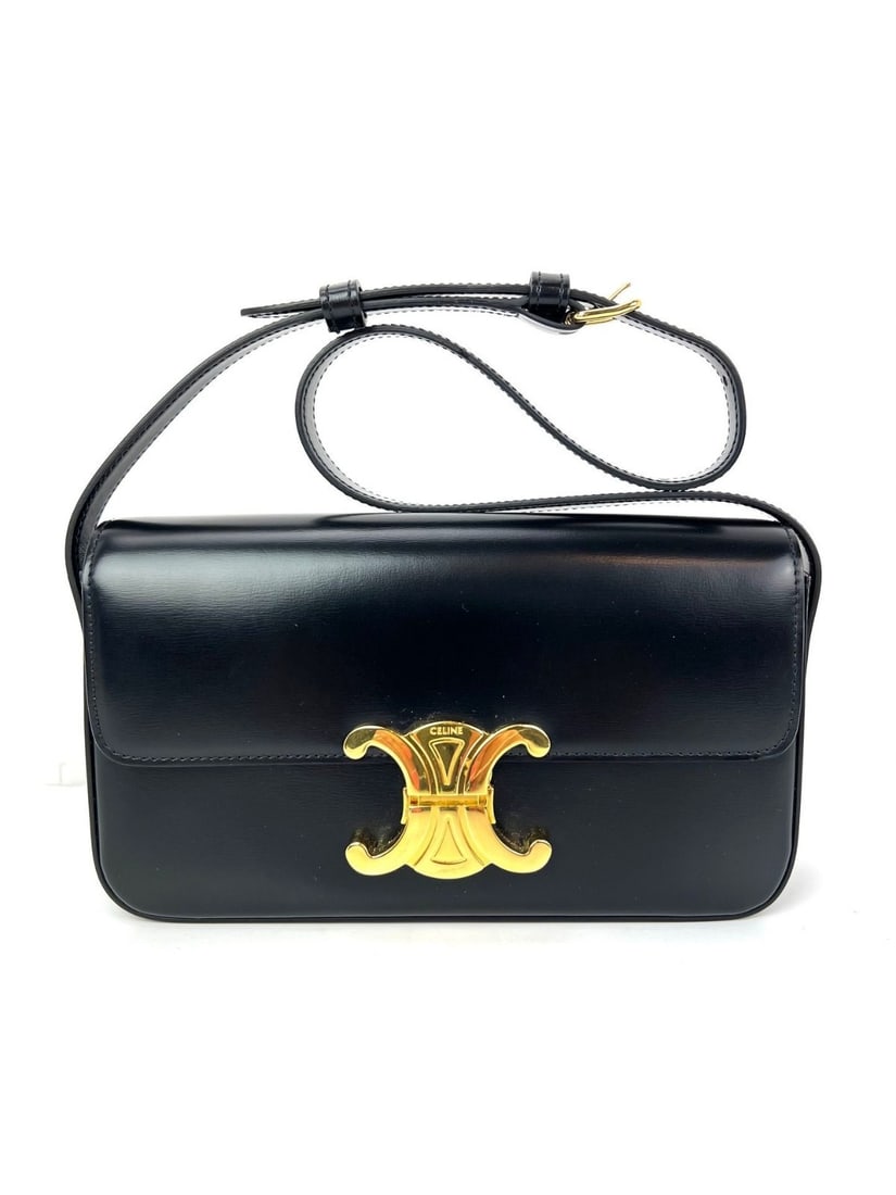 CELINE Triomphe Small Black Leather Shoulder Bag with Dust Bag: CELINE Triomphe Small Black Leather Shoulder Bag with Dust Bag Pre-owned Celine Triomphe shoulder bag in black shiny calfskin with a structured rectangular silhouette and push-lock closure. This small