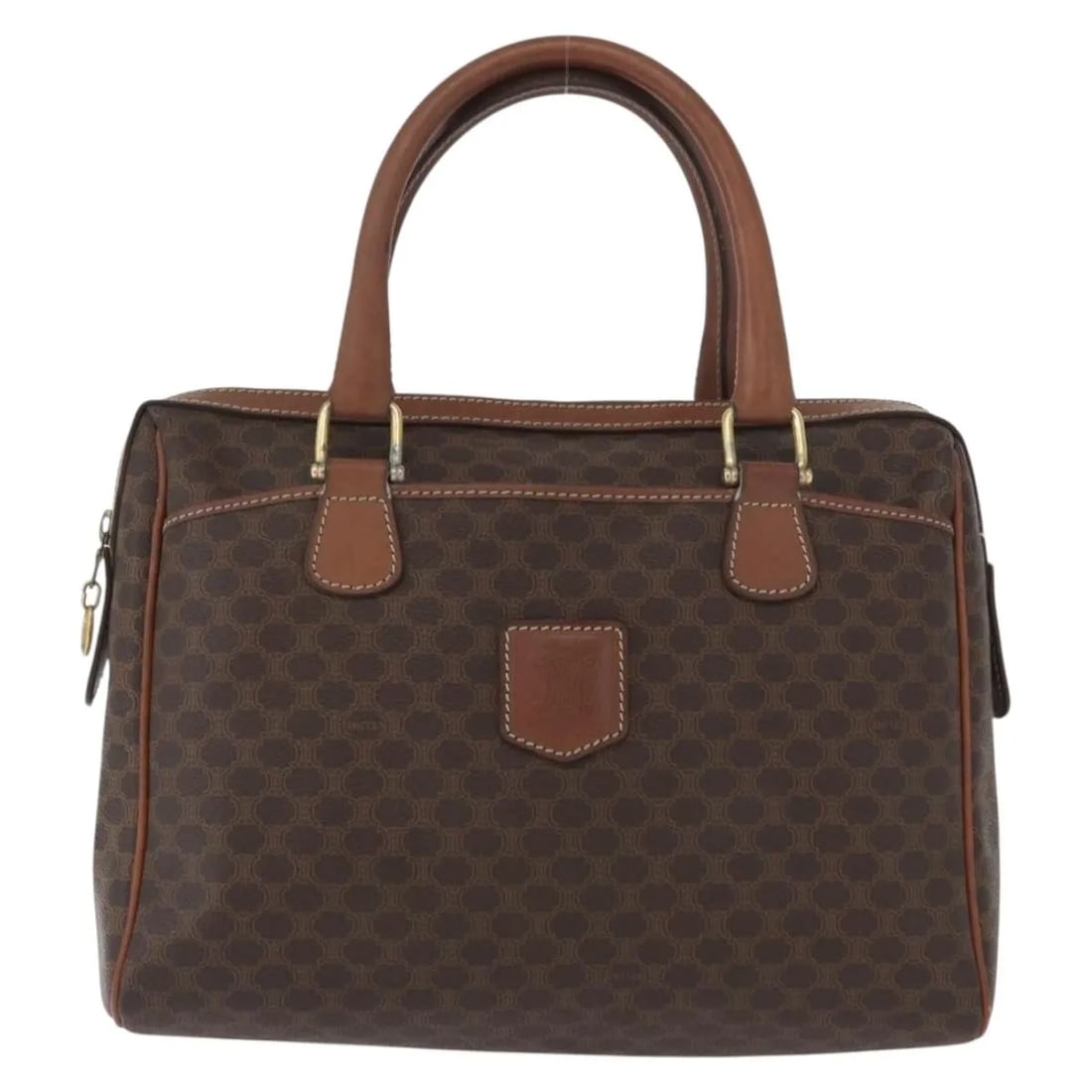Vintage Macadam Shoulder Bag by Celine in Brown Canvas and Leather: Vintage Macadam Shoulder Bag by Celine in Brown Canvas and Leather This Celine Vintage Macadam handbag is crafted from canvas with leather accents in a brown colorway. Made in Italy, it features a spa