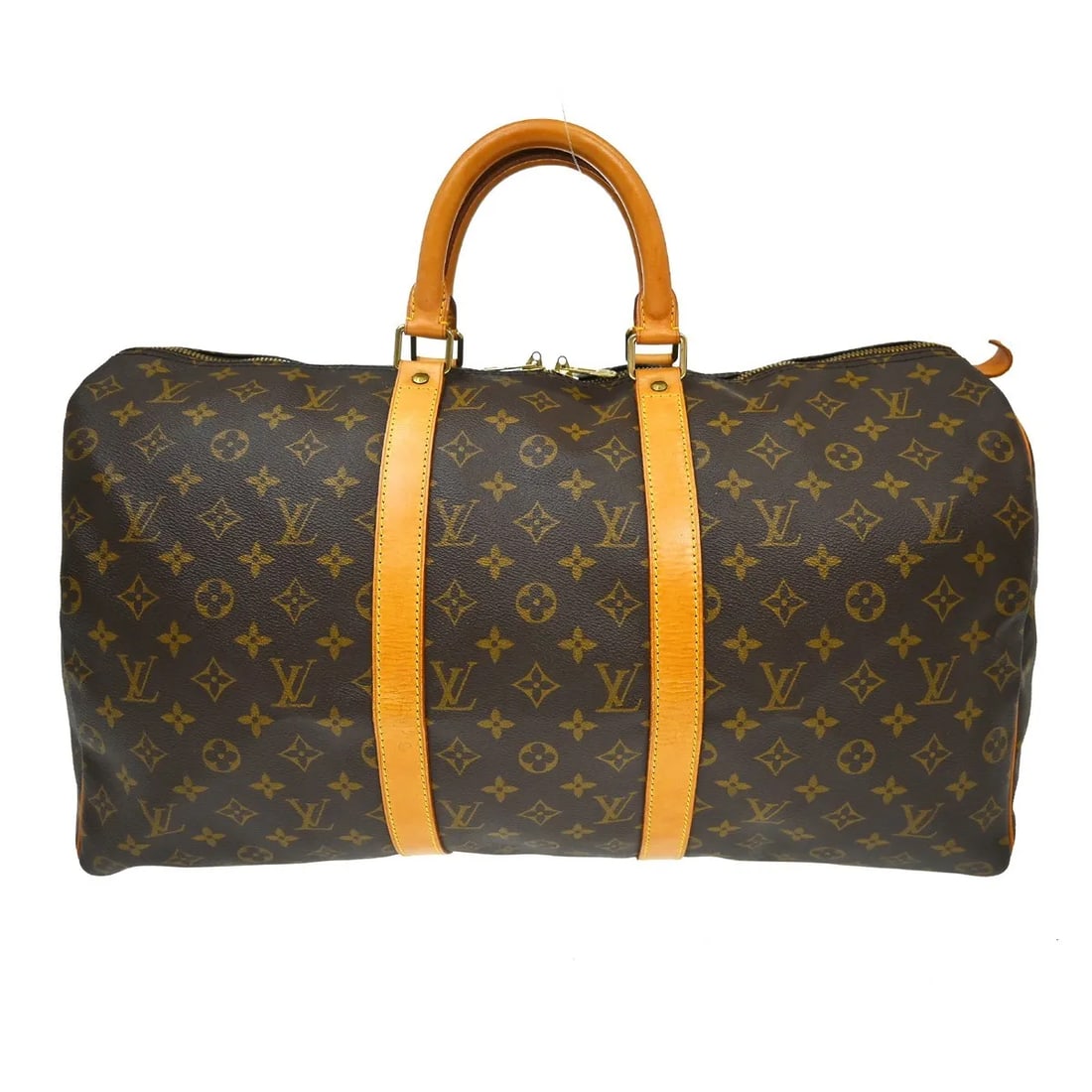 Louis Vuitton Keepall Travel Bag in Brown Monogram Canvas: Louis Vuitton Keepall Travel Bag in Brown Monogram Canvas Louis Vuitton Keepall in brown monogram canvas. This unisex bag is in good condition with visible wear, including scuffs and scratches on the 