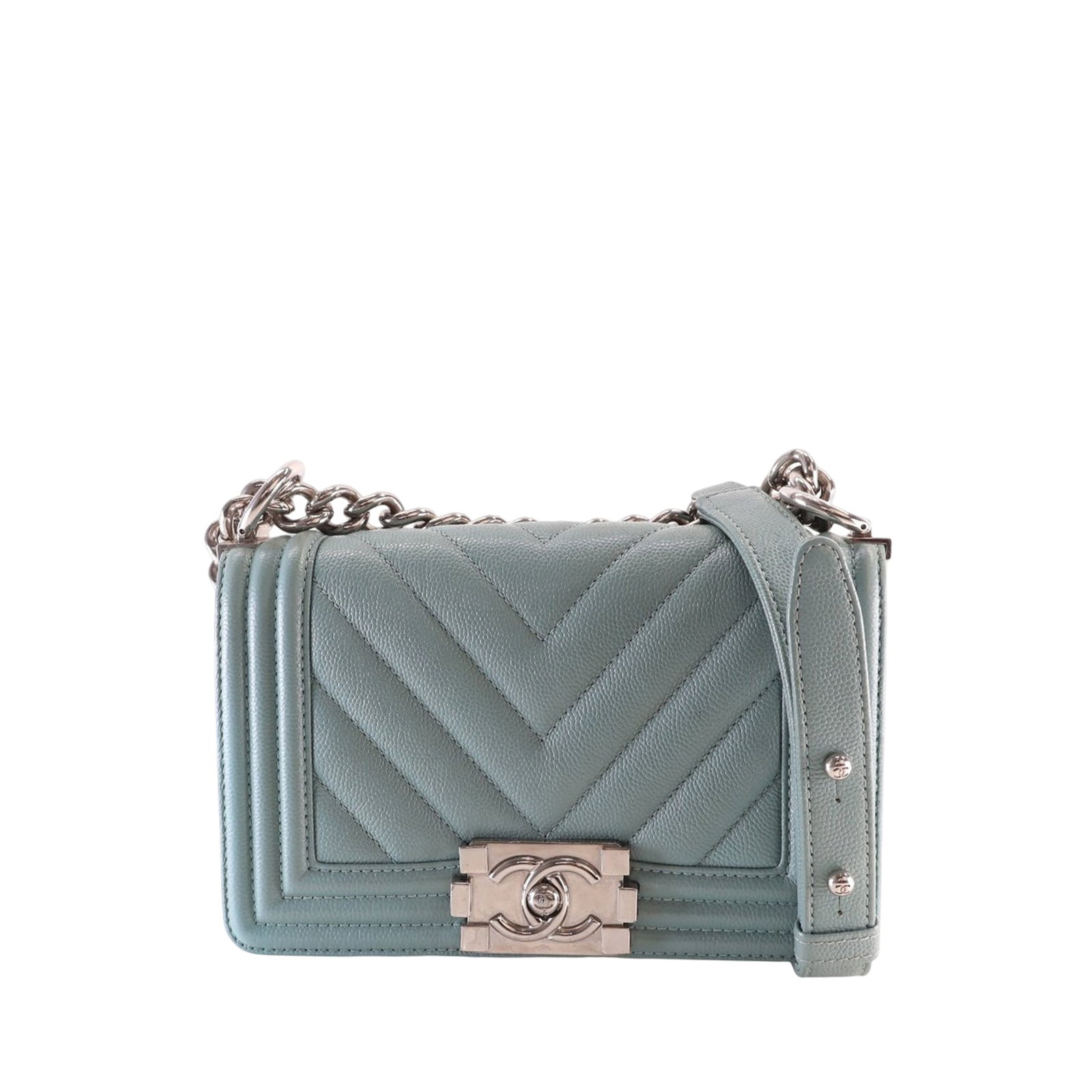 Chanel Boy Flap caviar leather small chevron blue: Chanel Boy Flap caviar leather small chevron blue This Chanel Small Chevron Caviar Boy Flap bag features a quilted caviar leather design in blue, accented by a curb chain strap with a leather guard. T