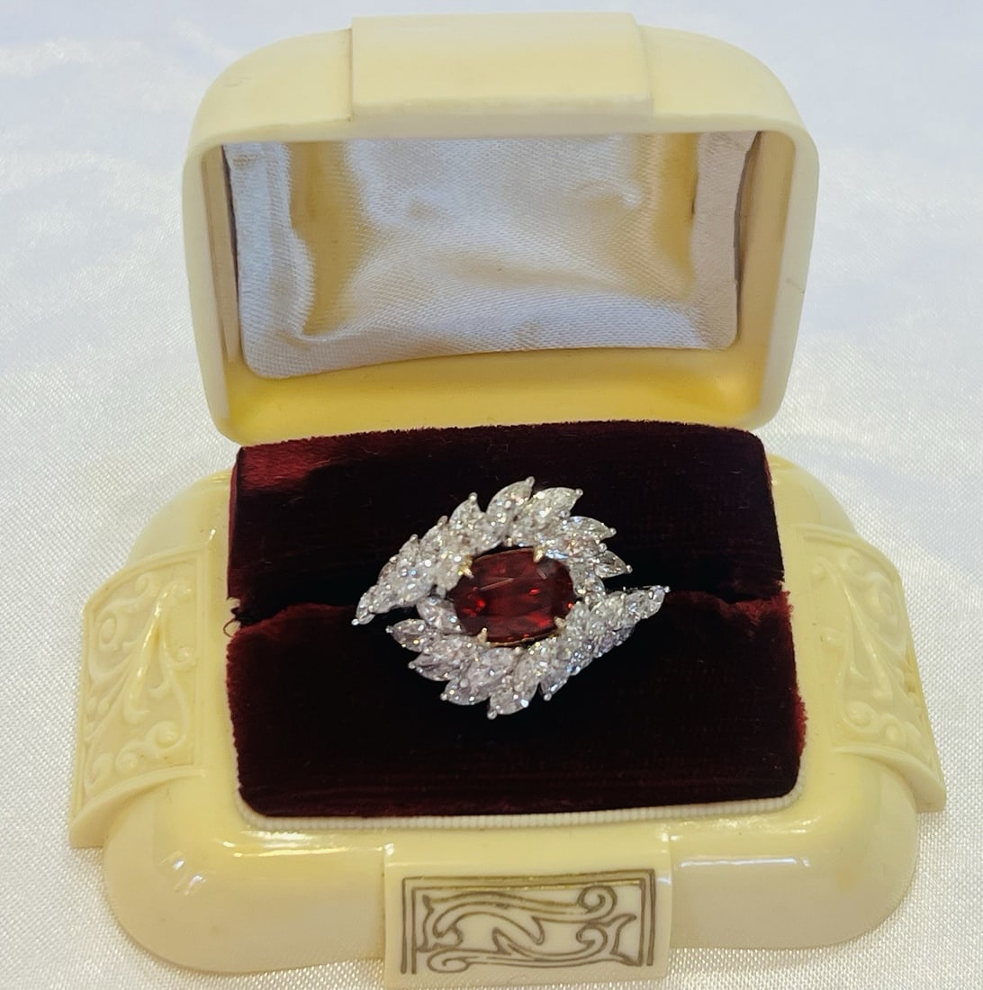 GIA Certified Platinum Burma Spinel Diamond Engagement Ring Size 7: GIA Certified Platinum Burma Spinel Diamond Engagement Ring Size 7 This exquisite engagement ring features a 2.15-carat oval Burma spinel as the centerpiece, complemented by 3.50 carats of marquise-sh