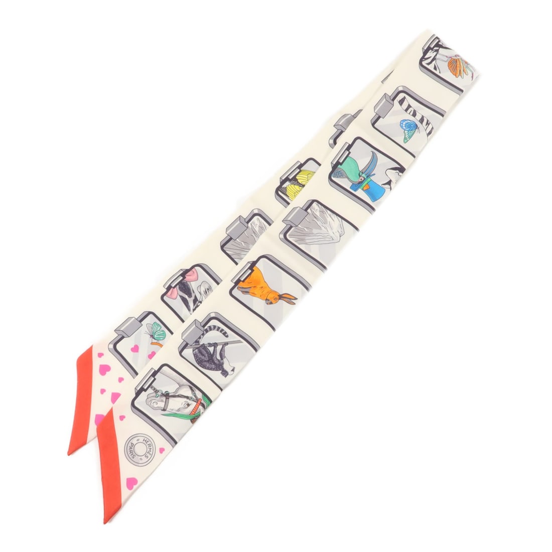 Hermes Twilly Silk Multicolor Women Scarf: Hermes Twilly Silk Multicolor Women Scarf This Hermes Twilly scarf is crafted from luxurious silk and features a vibrant multicolor design. Made in France, this women's accessory showcases the brand's
